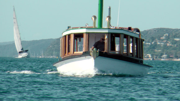 MV Reliance with yacht